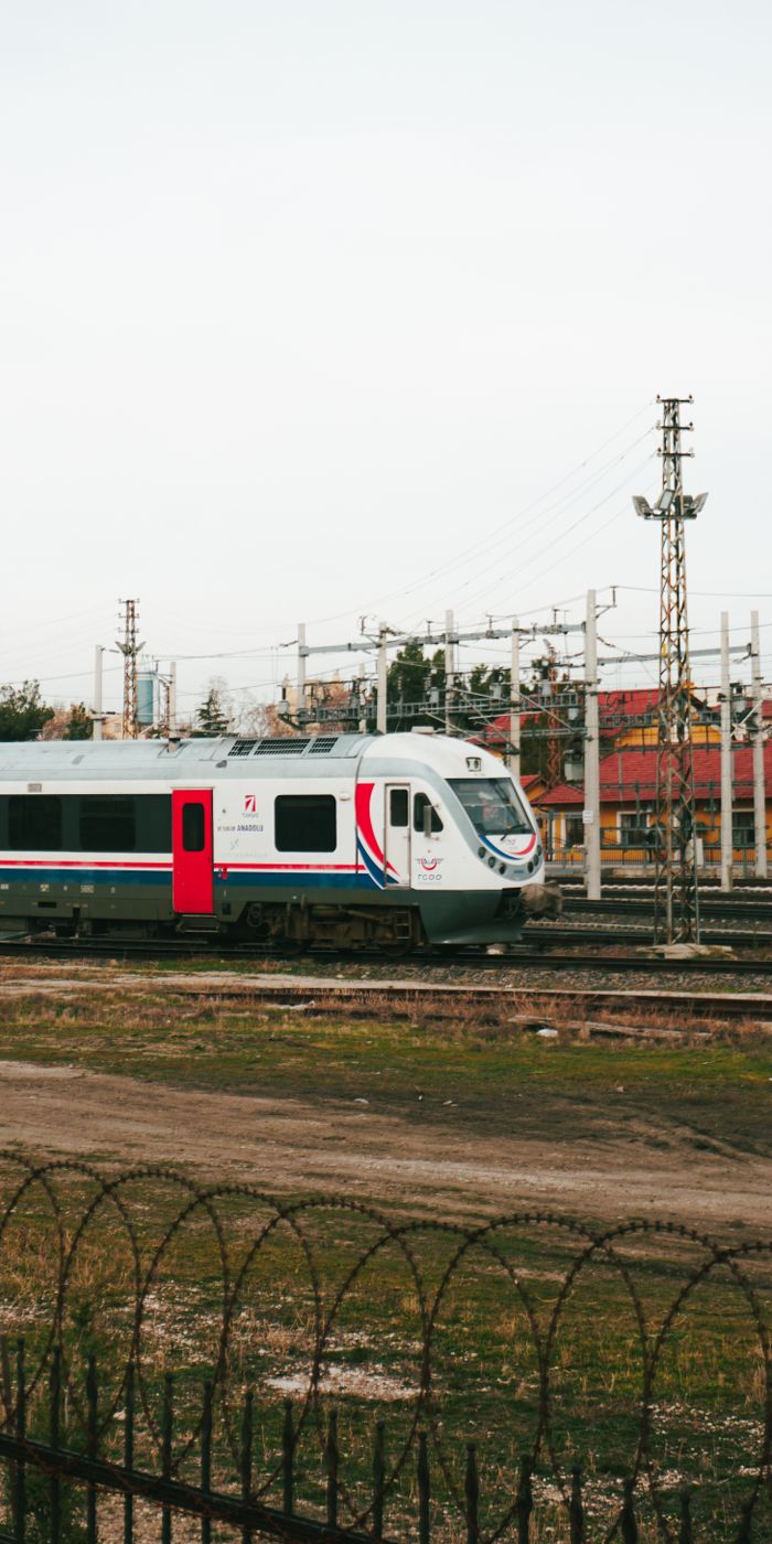 portfolio-04 High-speed train traveling on tracks in Konya, Türkiye, showcasing modern transport infrastructure.